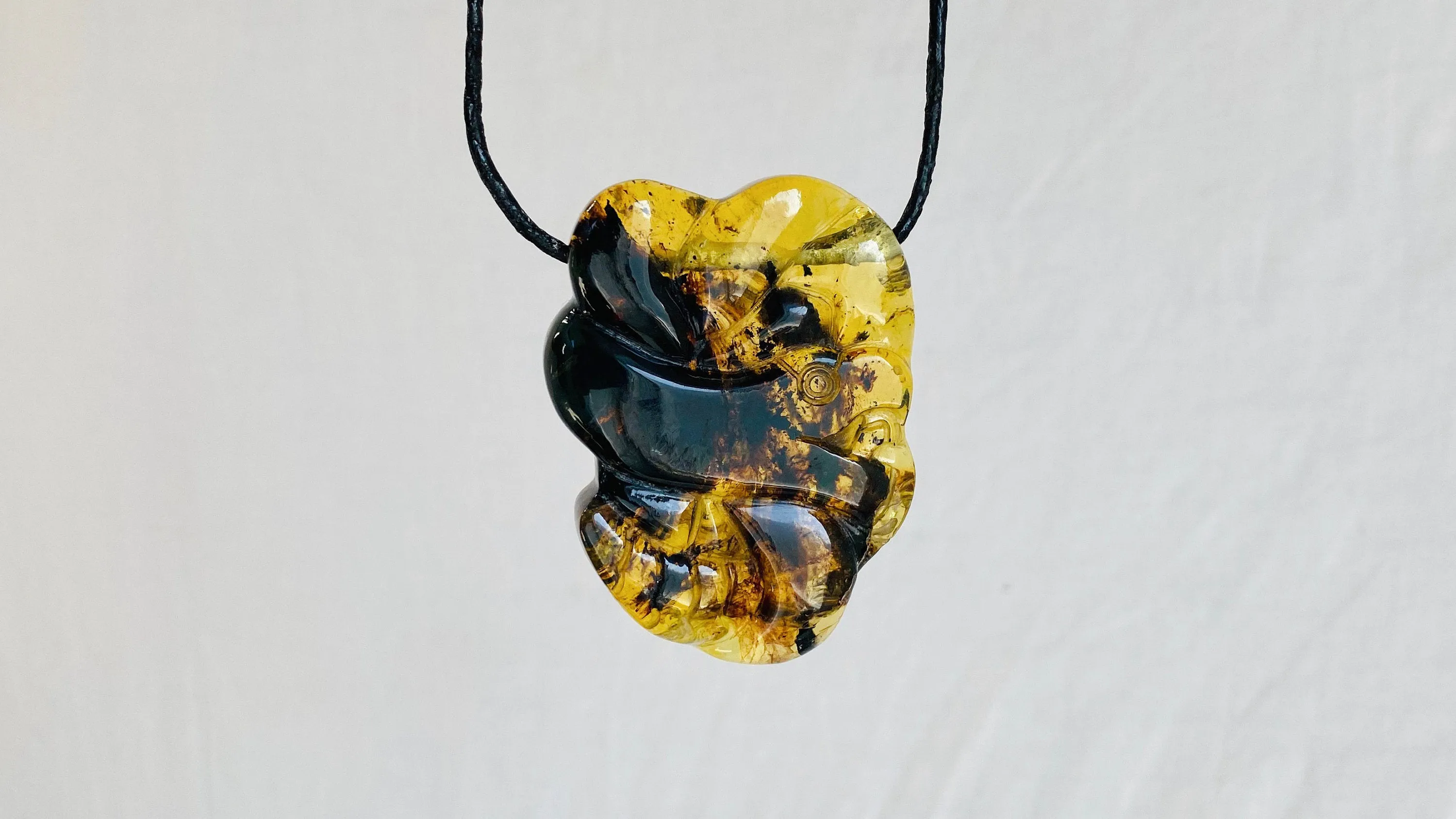 Coiled Serpent Amber Pendant. Aztec Replica